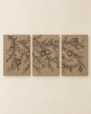 Three vertical canvas wall art panels arranged side by side, featuring a botanical branch pattern with leaves and small round fruit in dark brown on a warm beige background, displayed against a light beige wall.
