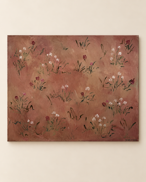 A horizontal canvas painting featuring delicate white and burgundy wildflowers with green stems on a textured, warm reddish-brown background, displayed on a light beige wall.
